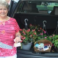 Assistance-League-Delivers-Flowers-and-Masks-to-Heritage-Village